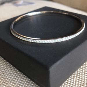 Bracelet- costume jewelry (silver band)